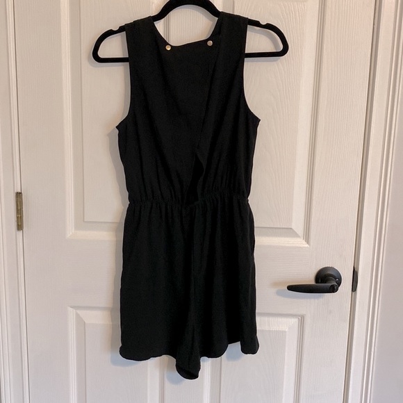 Black shorts romper, size small, elastic waist, side pockets, EUC, gently worn. - Picture 7 of 10